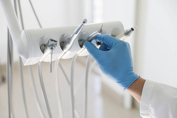 Professional Emergency Dentist technician working in Flora, IL